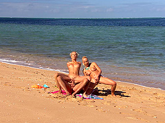 Justine Ashely and Diana Gold love riding a boner on a beach