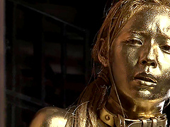 Japanese woman covered in golden paint fucked hard by her partner