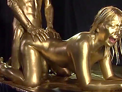 Ai Uehara is a babe covered in golden paint craving a cock