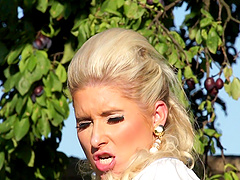 Blonde Leony in thong moaning while her pussy is licked outdoor