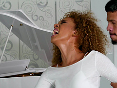 Flat-chested wild-haired Xianna Hill bouncing on Bambino's rod