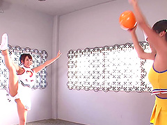 Two Japanese cheerleaders stretching and having fun with their pussies