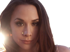 Brunette stunner Chanel Preston having fun with a black cum gun