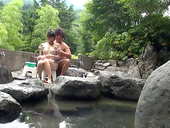 Outdoors fucking in the bath between a lucky guy and a sexy babe