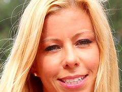 Busty blonde MILF Alexis Fawx jerks a stiff dick outdoors