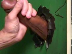 Naughty gay dude enjoys sucking on a dick in the glory hole