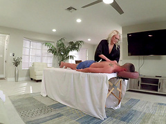 Natural tits Sunny Hart gives a massage and rides his cock