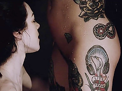 Tattooed model Joanna Angel gets her pussy pleasured by sexy Stoya