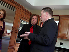 Britney Amber stuffs her throat and pussy with cock for a cum shot