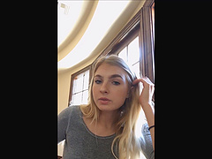 Amateur long haired blonde Angelina puts on makeup in public