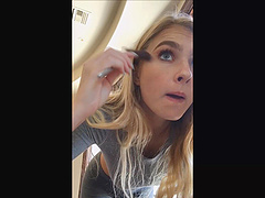 Amateur long haired blonde Angelina puts on makeup in public