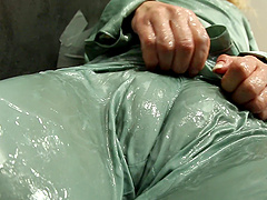 Glamorous nerdy blonde covered with cream from a fake glory hole cock