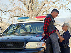 Cop slut Bridgette B pulls over a guy for a fuck on the hood of a car