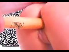 Blonde milf Greta demonstrates her cunt and fucks it with a bat