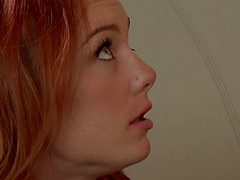 Pale blue eyed redhead Dani Jensen sprayed with cum on face