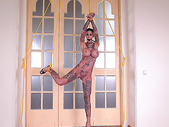 Tall inked babe Calisi Ink tied up and rough fucked by two guys