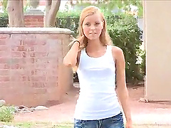 skinny and cute blonde masturbates in the public park using her fingers