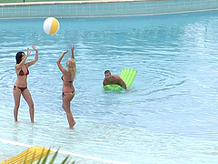 Crazy outdoor threesome by the public pool with two sexy babes