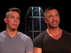 Tied up guy with tattoos enjoys while two gay dudes please him