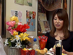 Oiled Japanese spreads her legs for a penis on the massage table