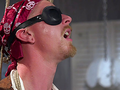 Costumed gay Cody Winter enjoys a blowjob by his kinky boyfriend