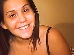 Brunette moans during the masturbation with a vibrator on the bed