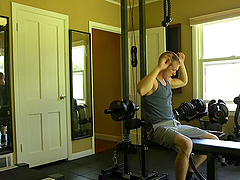 Slender dude tied up to a chair and gets his dick pleasured