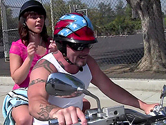 Skinny brunette on her knees sucking a dick and eating cum