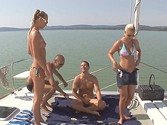 Kinky sex games on the private boat with two adorable pornstars