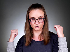 Solo model moans with pleasure while playing with a dildo