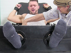 Muscular dude tied up and ticked by an older pervert in HD