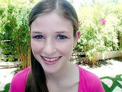 Cute teen Lara Brookes gives a nice handjob outdoors