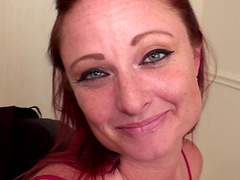 Redhead mature Sandi Lymm loves pleasuring her pussy while home alone