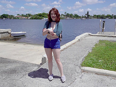 Busty amateur redhead Annabel Redd gives a titjob to a stranger