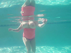 Neighbor Brandy Talore gives a titjob with her massive juggs