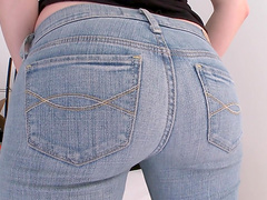 Big butt redhead Lilith Lust takes off her jeans to ride a dick