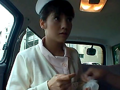 Passionate dick sucking by a kinky Japanese nurse in back of the car
