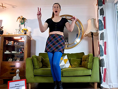 Solo brunette moans while fingering her pussy on the sofa - Lara