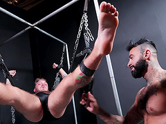 BDSM fetish video with a tattooed dude being tortured by his lover