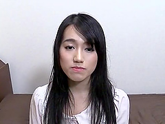 Amateur Japanese babe spreads her legs to masturbate with a toy