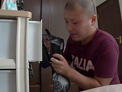 Seductive Japanese MILF shows her black lingerie and makes him hard