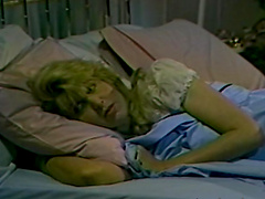 Retro porn video of a horny girl being roughly fucked on the bed