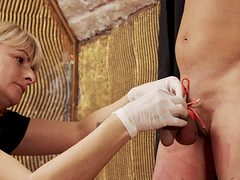 Blonde mistress Lady Yultsi loves punishing masked guy's dick