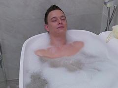 Julia Pink sucking a hard cock before being slammed in the bathroom