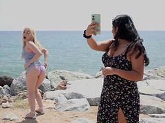 Mary Rock and Lisi Kitty having fun while fingering on the beach