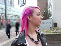 Pink haired babe Dolly Kitten showing her shaved pussy in public