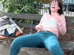 Kinky brunette girl Tiffany Naylor peeing on her pants outdoors