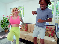 Blonde Karma RX with big boobs sucking a black cock before riding it