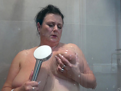 Big natural tits shower scene with Miranda Steel's soapy action