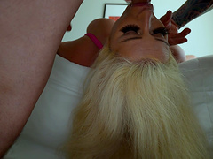 The blonde with big fake tits, Spencer Scott, gets a messy hot load in her mouth.